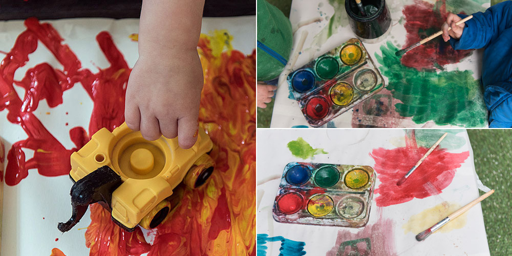 small hand admidst a joy of paint