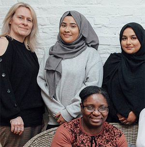 group shot of workers at minihome