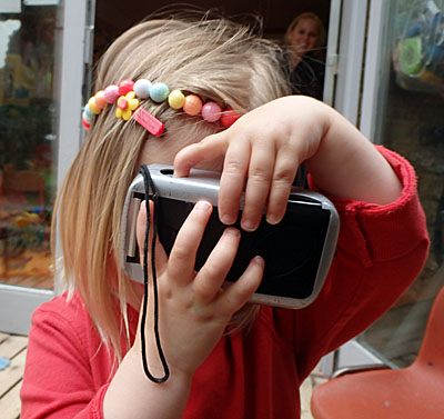 child at minihome nursery traces around la letter