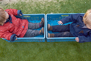 childern playing in the  minihome nursery garden